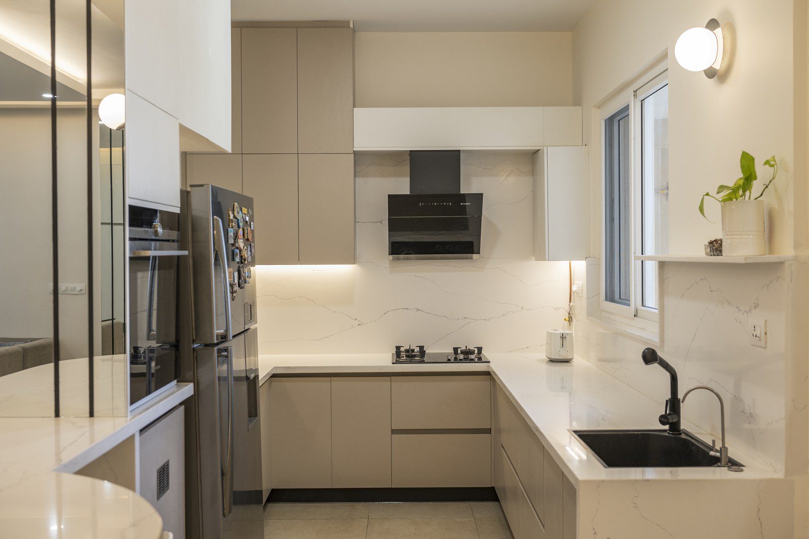 Modern minimalist kitchen with warm cabinetry tones, Bangalore