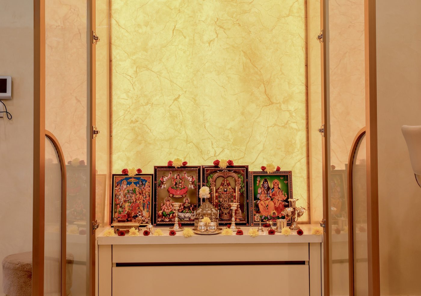 Read more about the article Modern pooja room design: blue, gold and quiet devotion