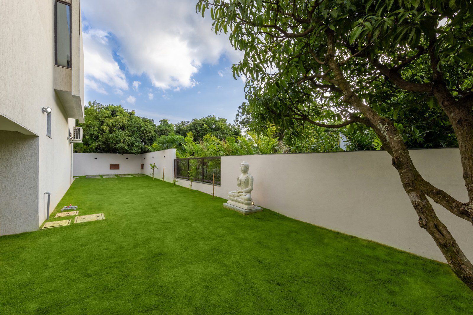 Landscaped garden and exterior of an independent villa interior design project in Bangalore