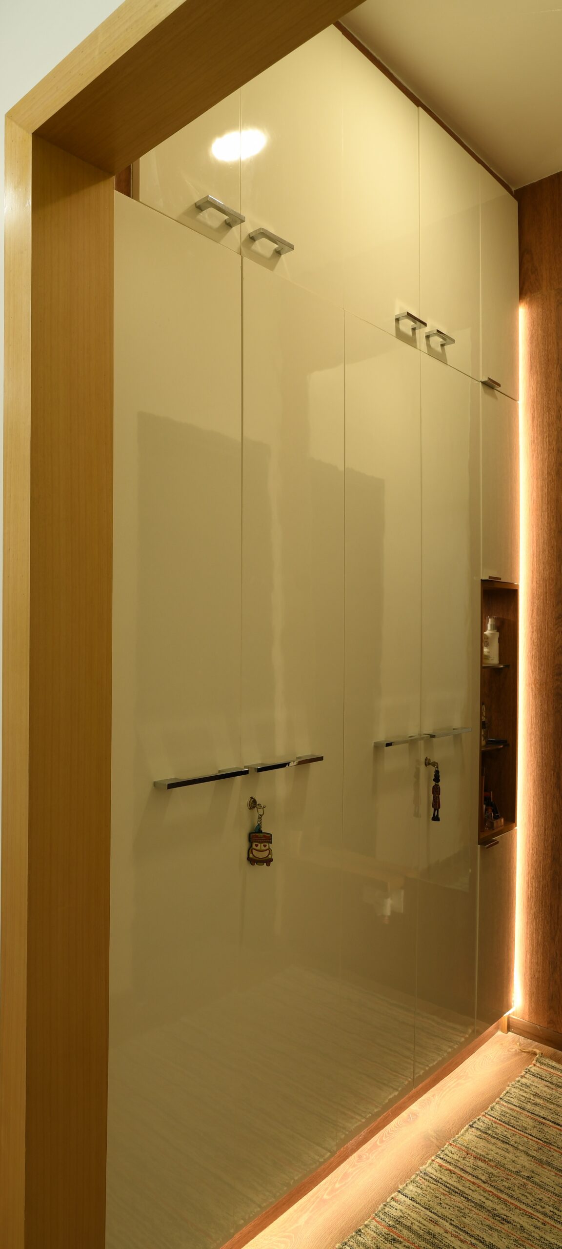 Lacquered wardrobe finish and hardware detail in a Bangalore home designed by Furdo